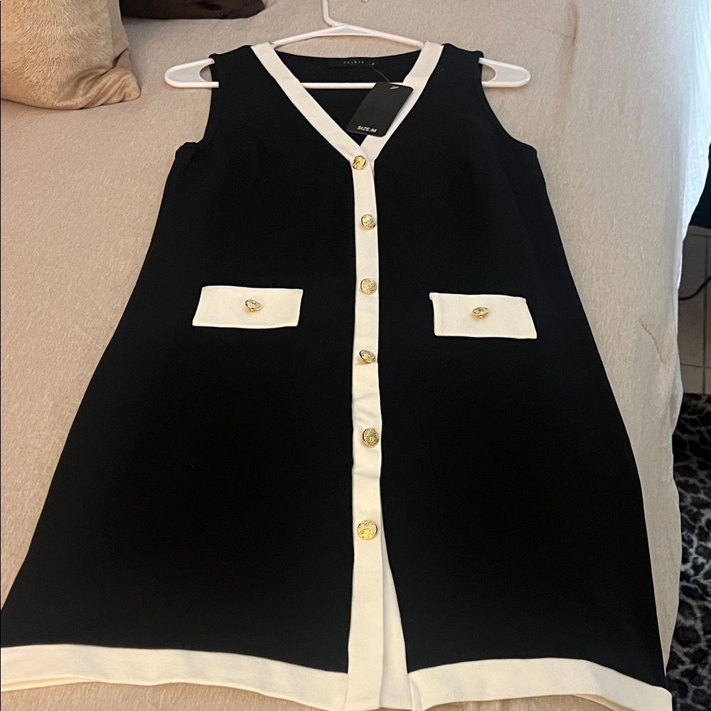 Black and White Sleeveless Dress with Gold Buttons